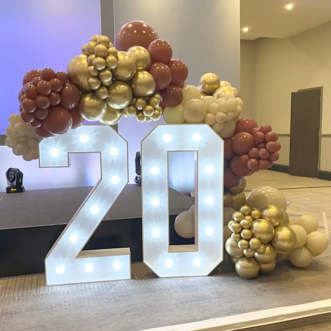 Light up 20 numbers with gold and rose gold balloon display