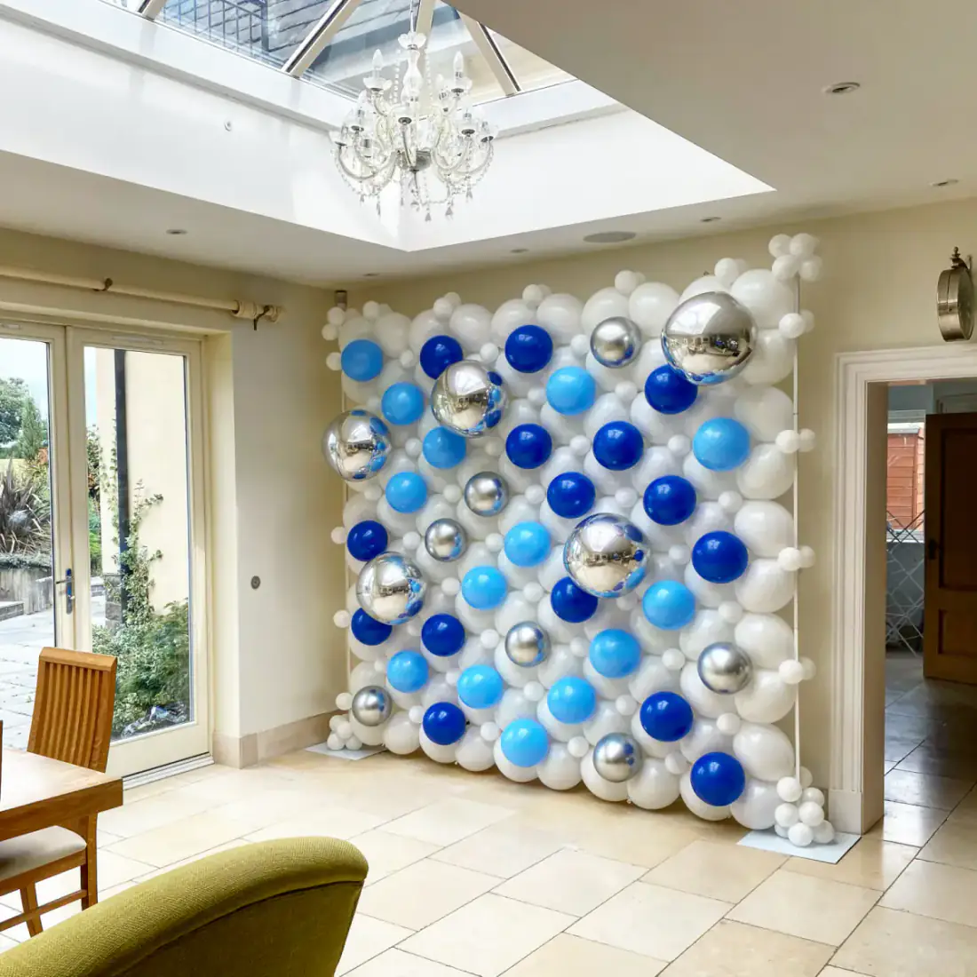 Blue silver and white balloon wall backdrop
