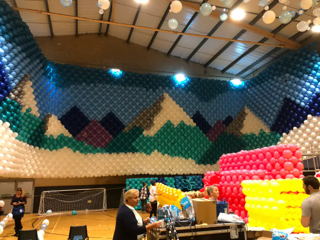 Balloon corridor scene in The Castle Christmas balloon build
