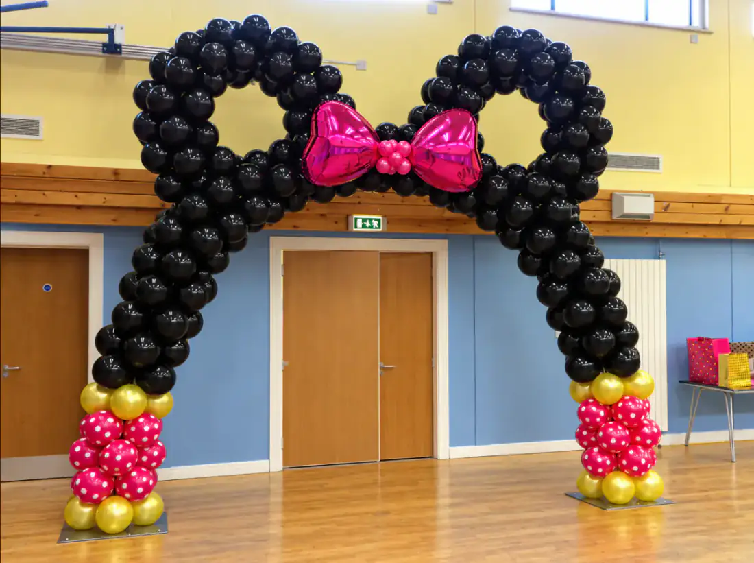 Black pink and gold Minnie inspired balloon arch