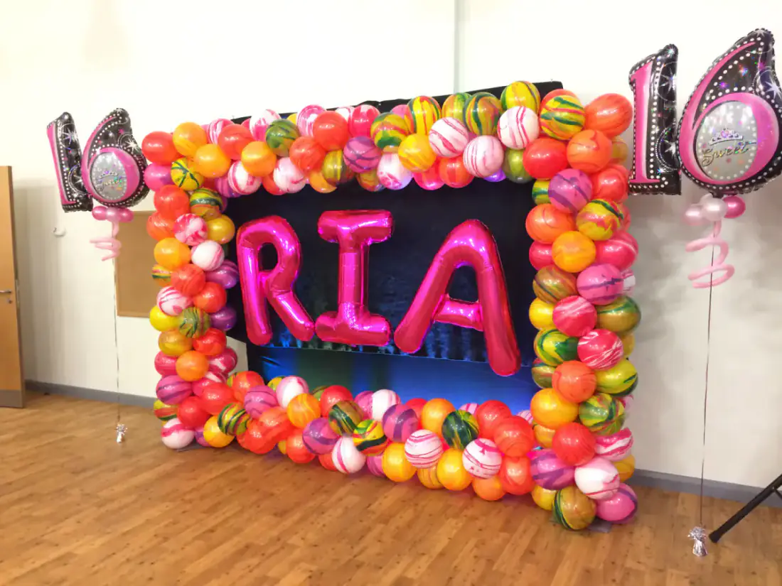 Aria first birthday balloon frame with pink foil letters