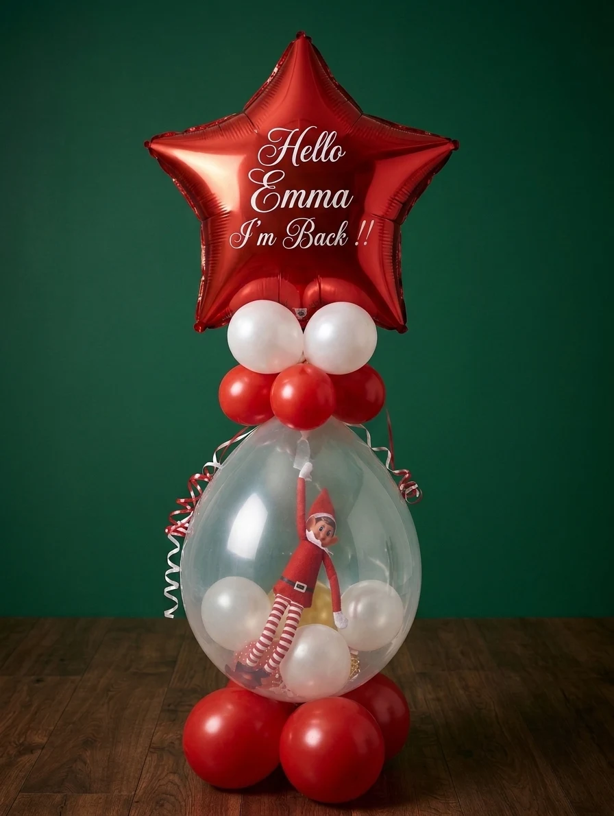 I'm Back display featuring a personalised foil star and red elf enclosed in a clear balloon