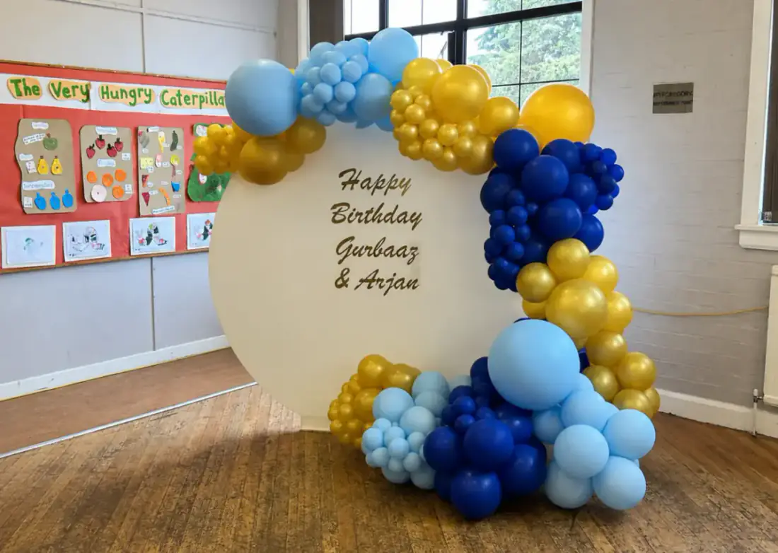 Organic Balloon Arch with Circular Board in blue and gold