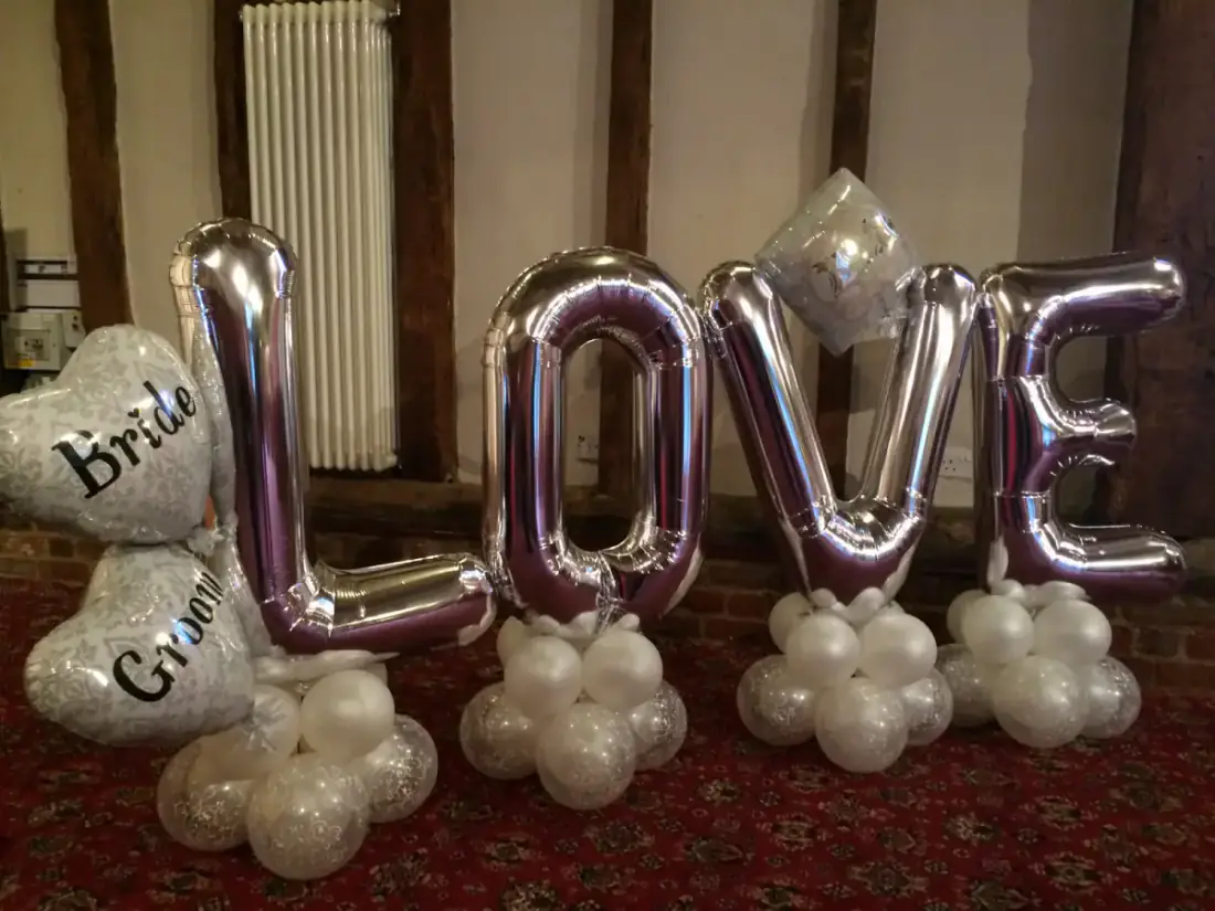 Silver LOVE letter balloons for wedding or engagement decor