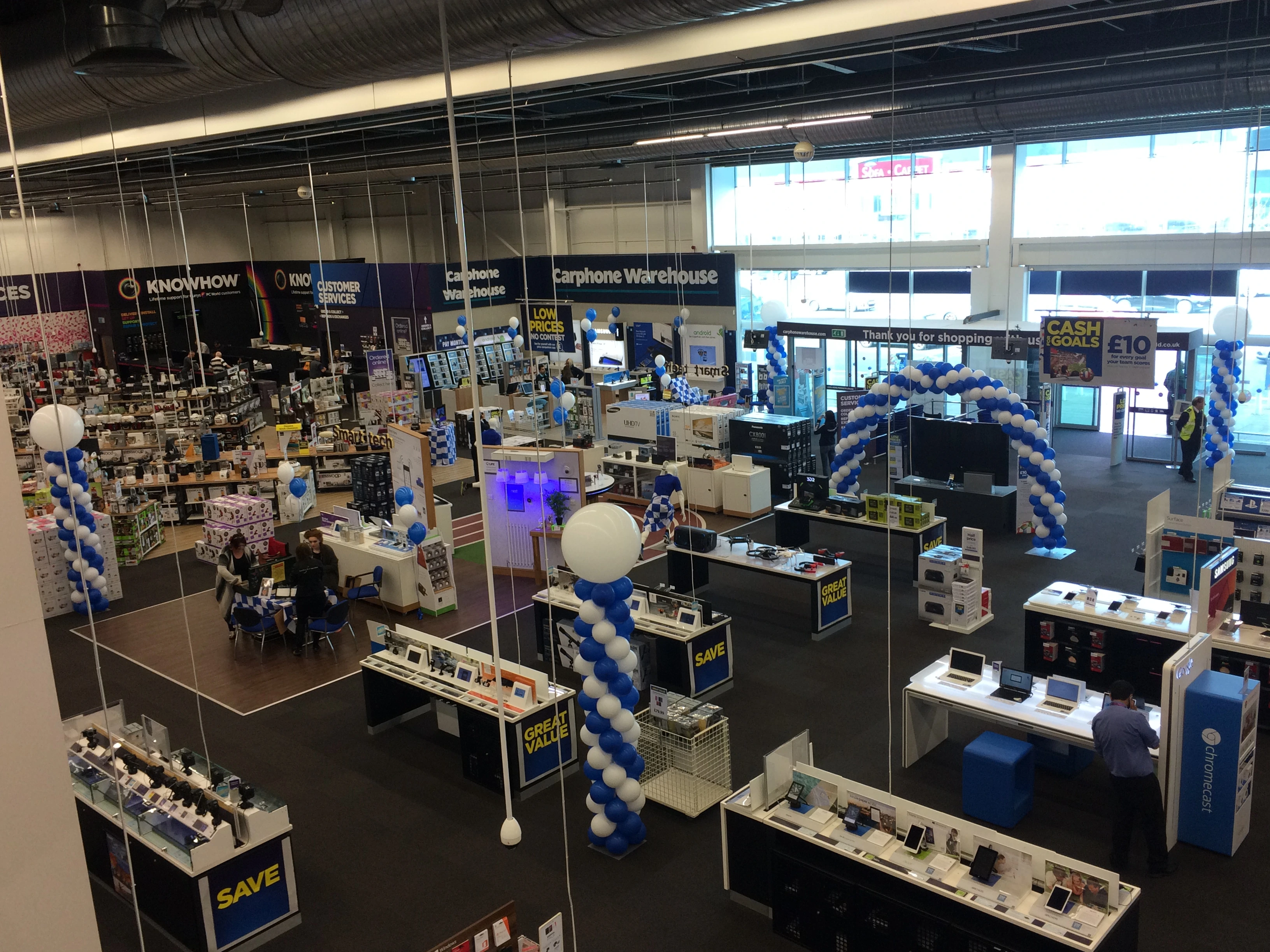 Large exhibition hall with blue and white balloon columns