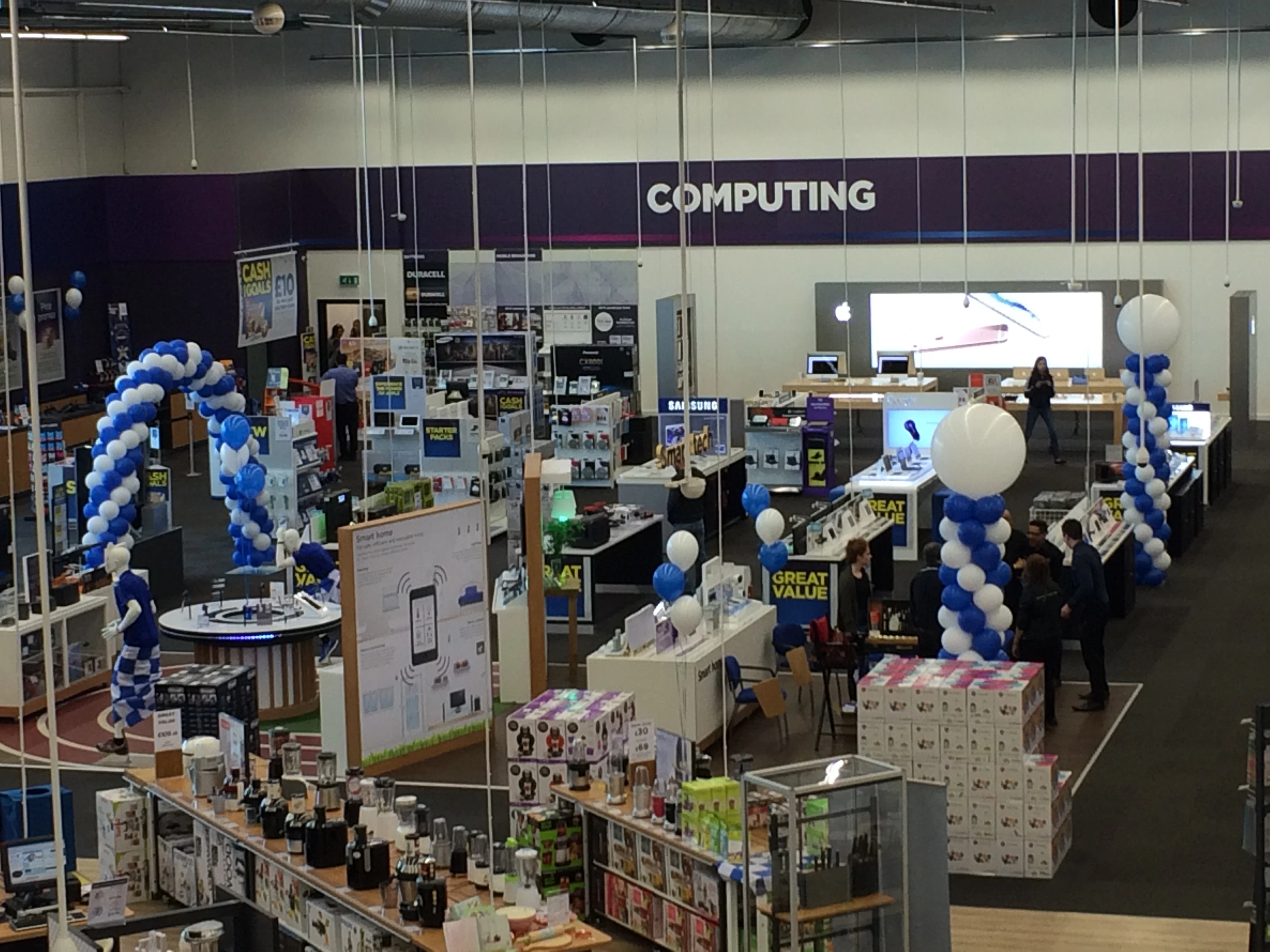 Open day exhibition space with blue and white balloon columns